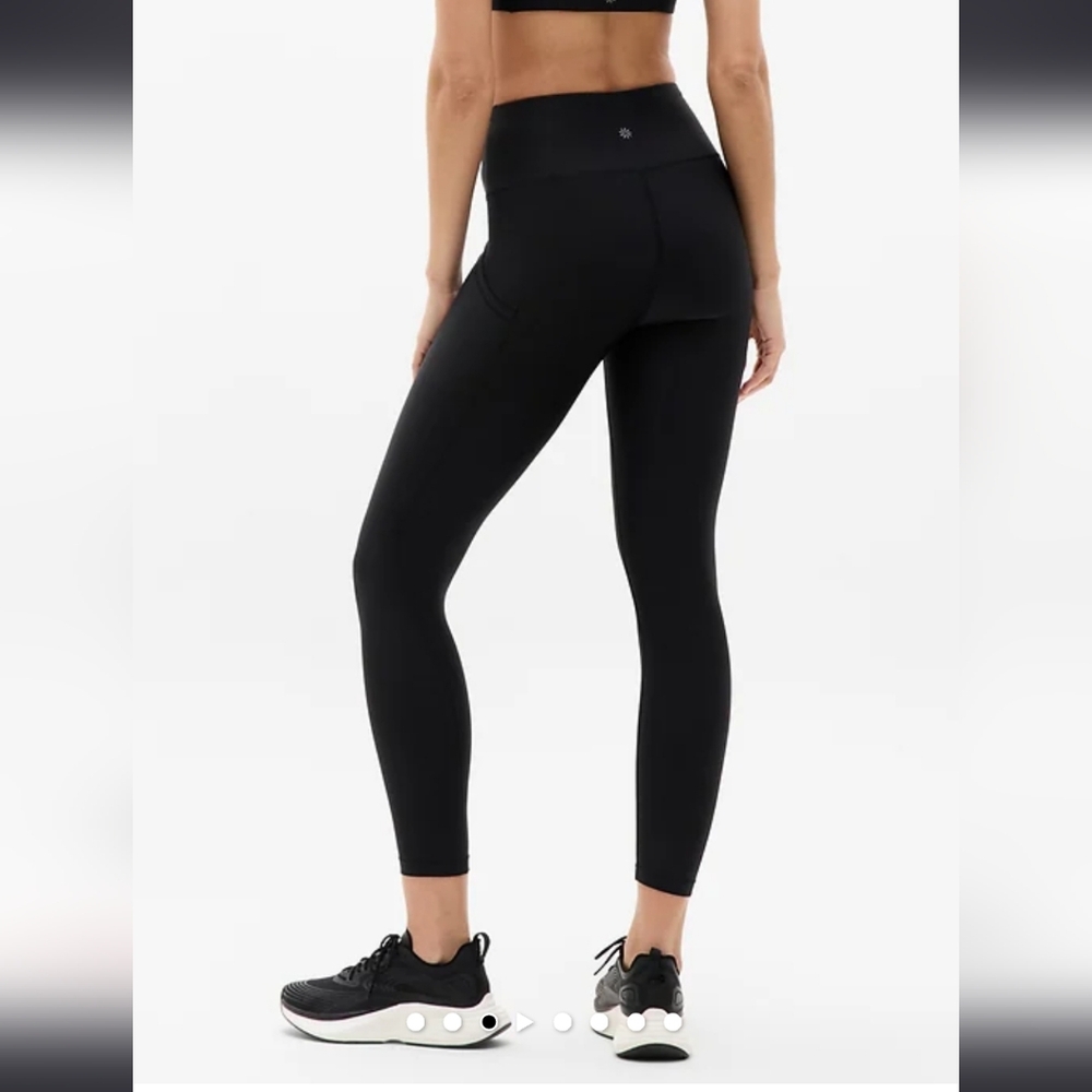 Athleta Interval Stash Lasercut 7/8 Tight in Dark Grey/Black With Side Pocket